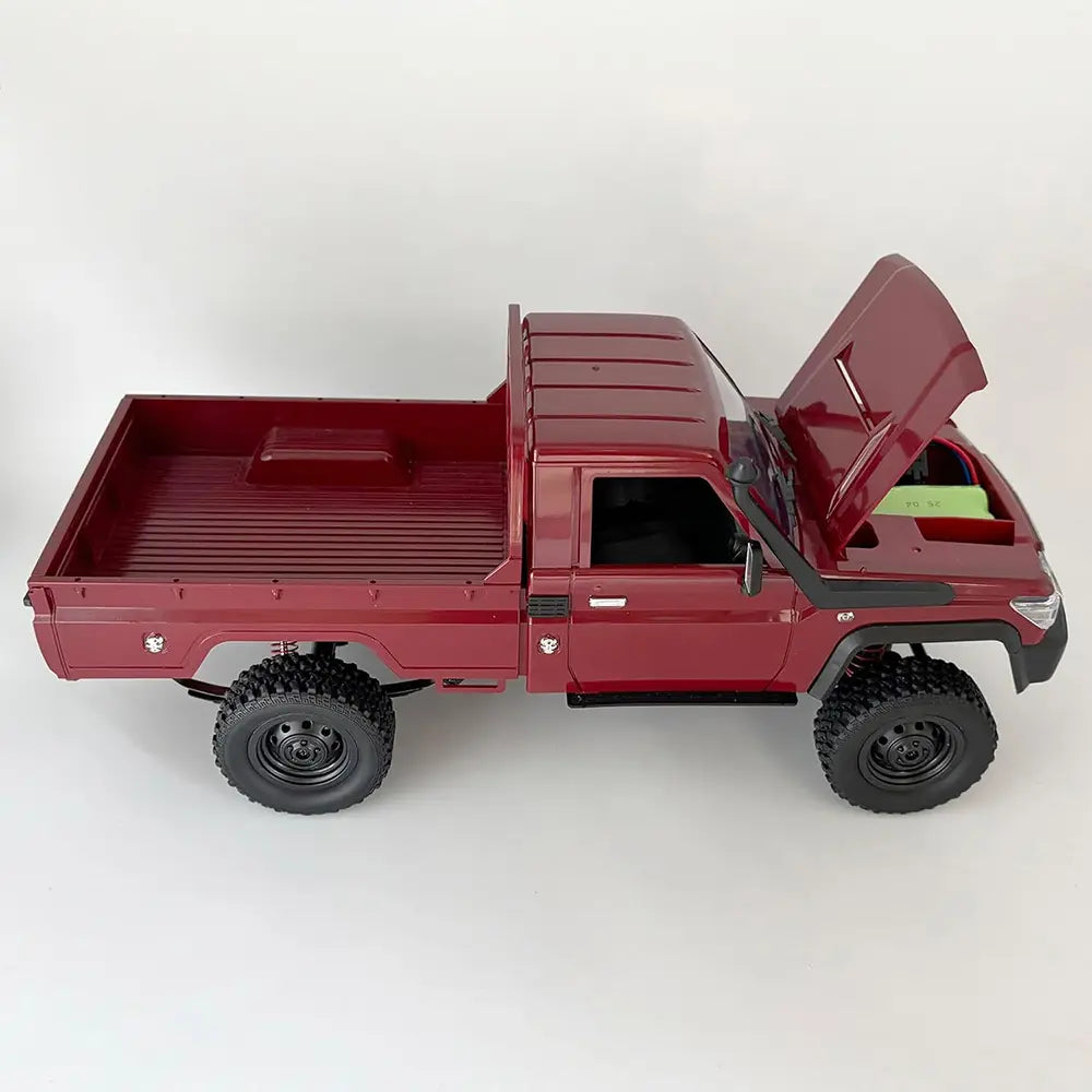 Conquer Any Terrain with the MN-82 RC Rock Crawler - 1/12 Scale 4WD Off-Road Remote Control Truck with Dual-Speed and Long-Range Control